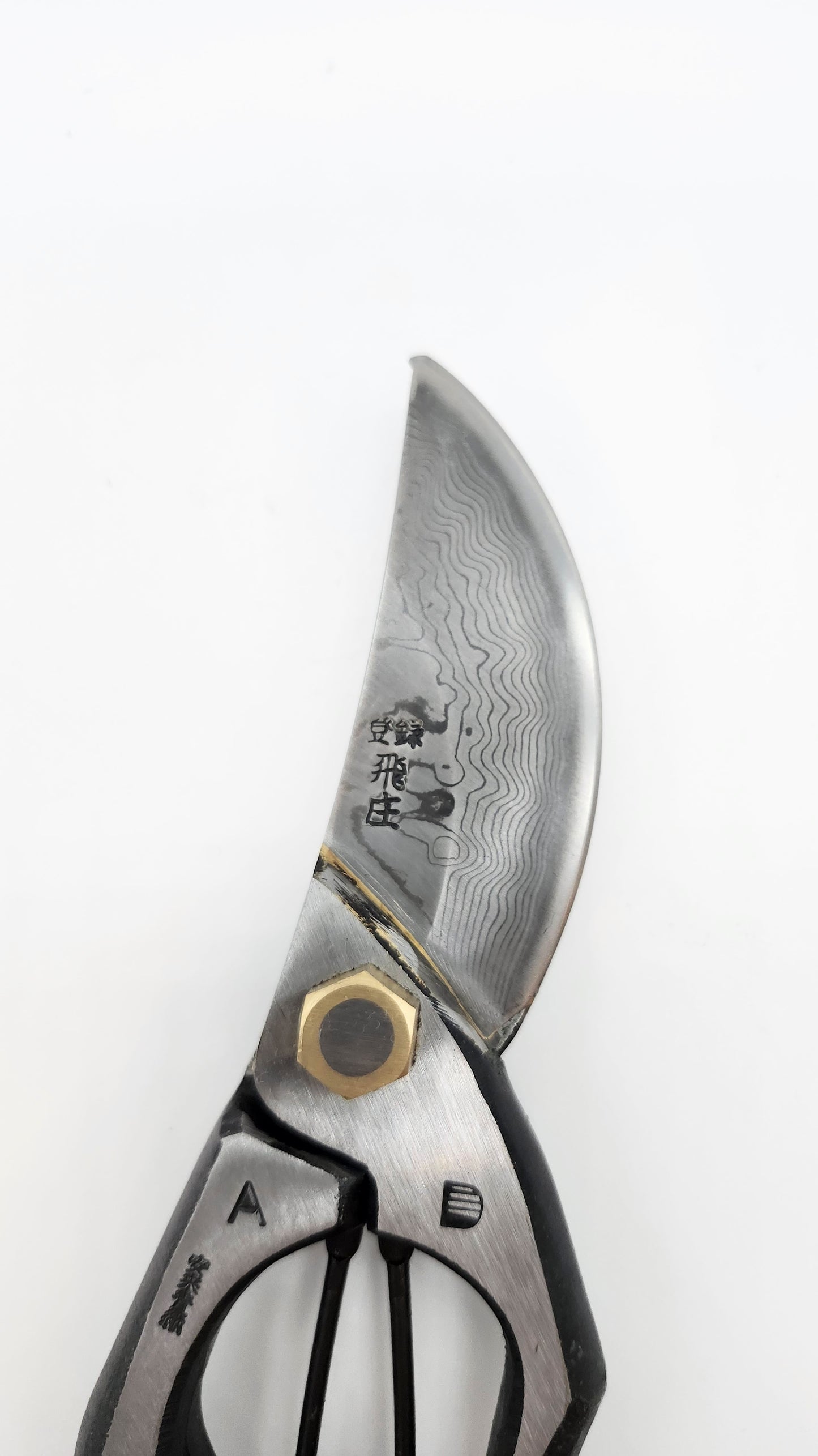 Tobisho Pruning Shears. Damascus steel construction with 16 layers of Yasuki Aogami Steel / blue paper steel.